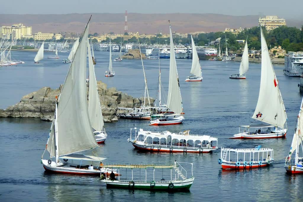 Felucca boats sailing on the Nile river, Aswan, Egypt