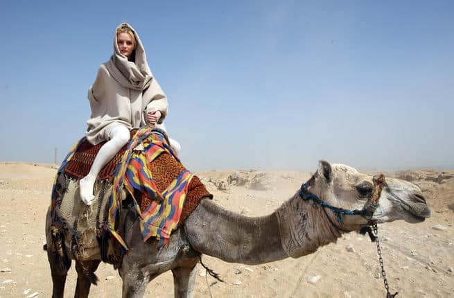 Traveler on a Camel by the Great Pyramids and Sphinx